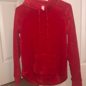a fuzzy red hoodie